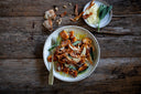 Ñoquis de calabaza con provolone, salvia y chips de mandioca